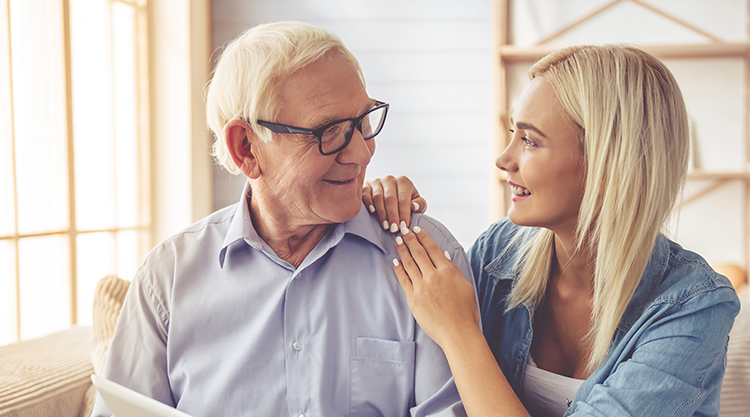 hearing loss - old man with younger woman